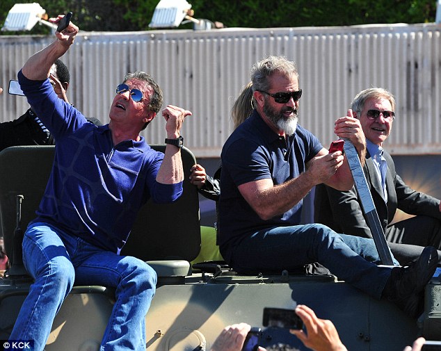 Stallone selfie: The Rambo star took a picture of himself and Gibson as they sat next to each other on the tank