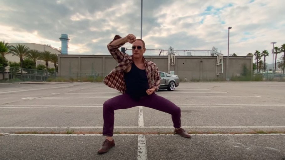 See Jean-Claude Van Damme Dance in Parking Lot in AaRON's New Video