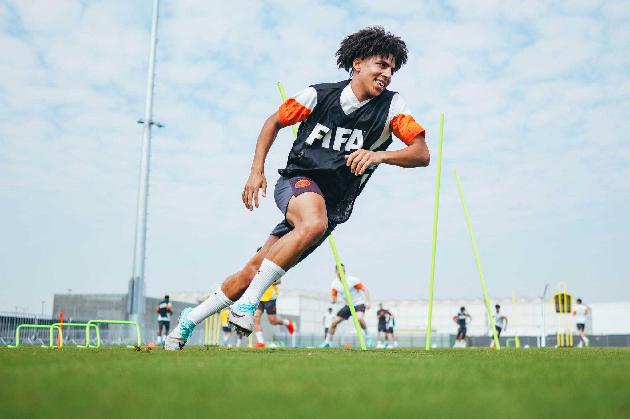 Could be an image of 5 people, people playing soccer, people playing soccer, sneakers and text