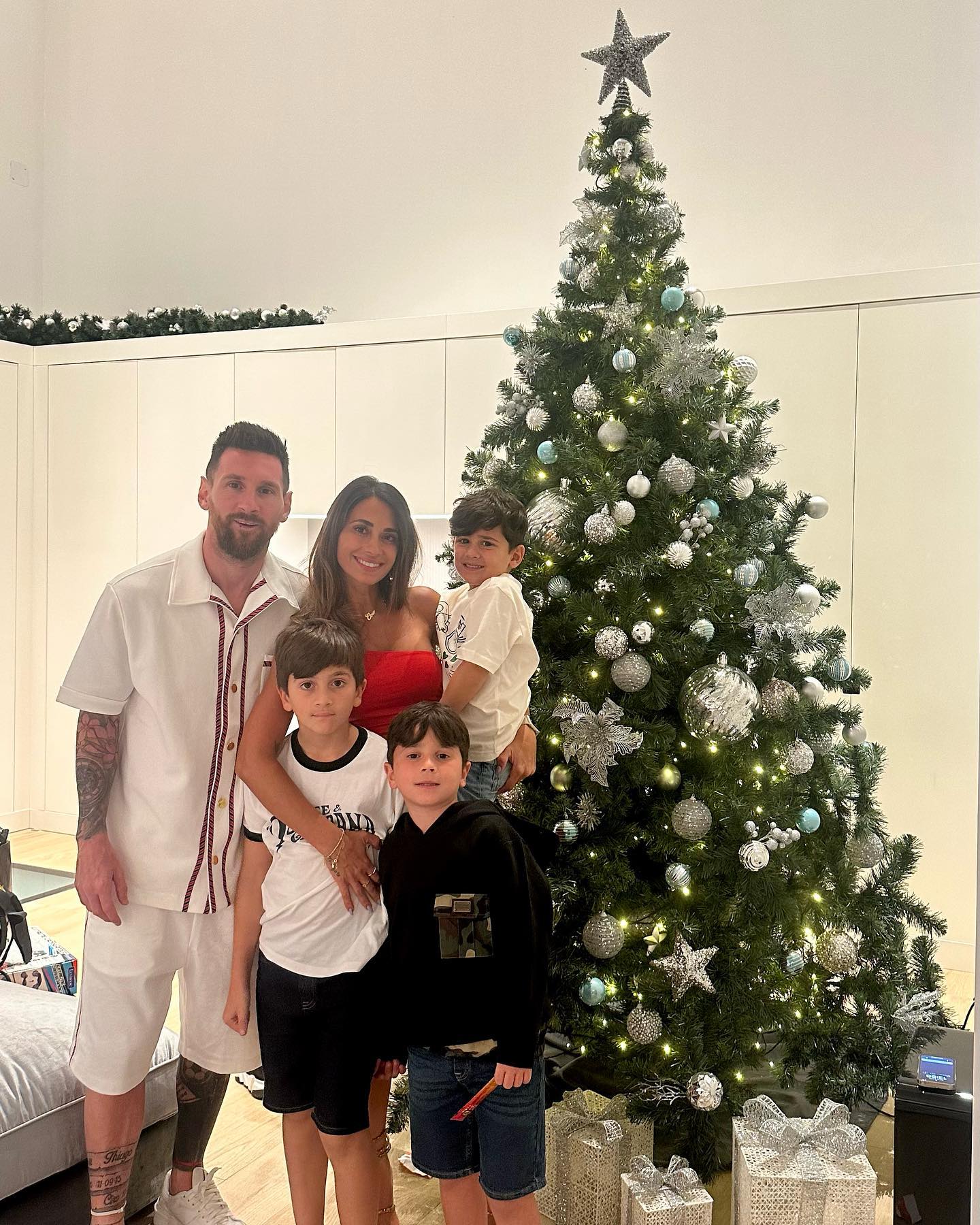 Lionel Messi also posed for a Christmas snap with his young family