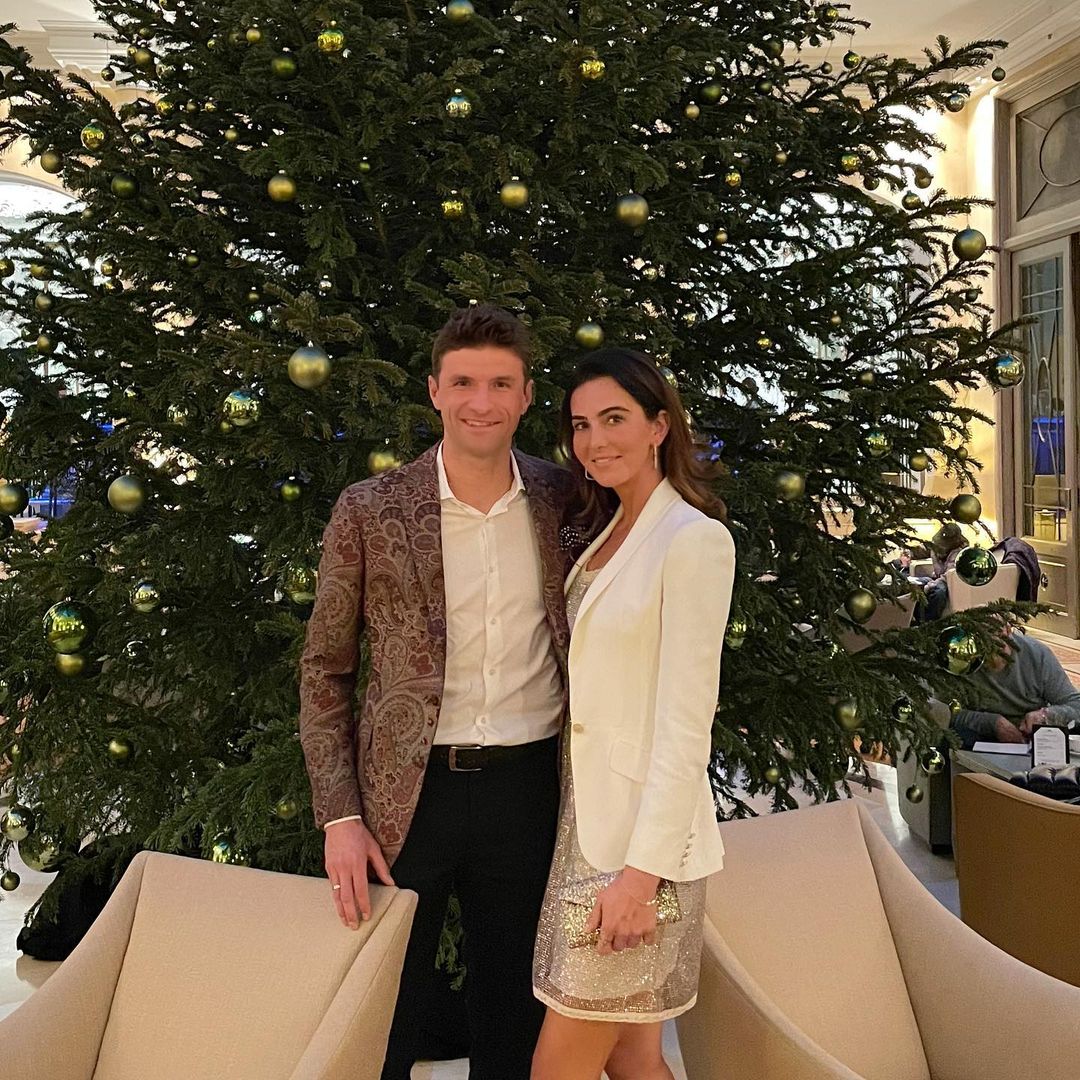 Bayern Munich hitman Thomas Muller posed in front of a massive tree with wife Lisa