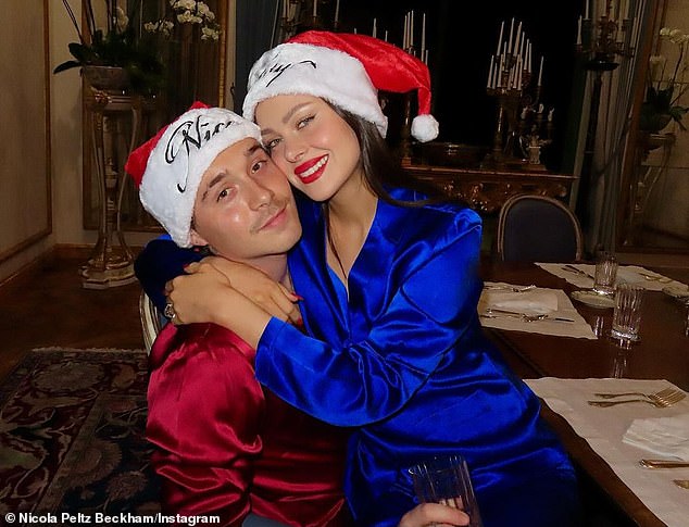 The gather came after the sweet couple posed in another set of pajamas at Christmas and wore complementing Santa hats, with Nicole's reading 'naughty' and Brooklyn's reading 'nice'