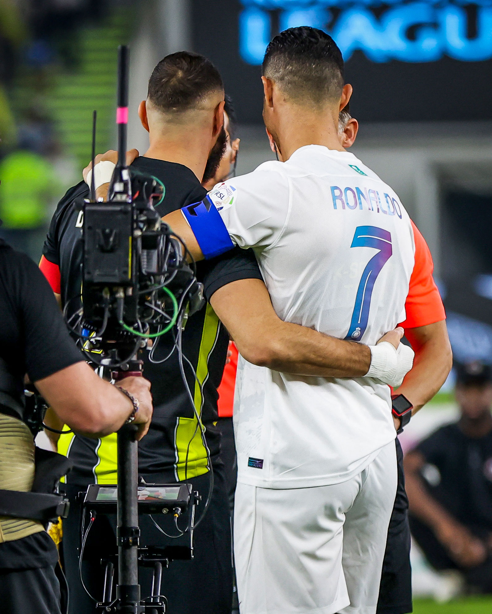 May be an image of 3 people, people playing football and text