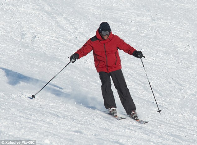 He's got the moves: Not only did Staham show off his snowboarding skills but he was quick on his skis too