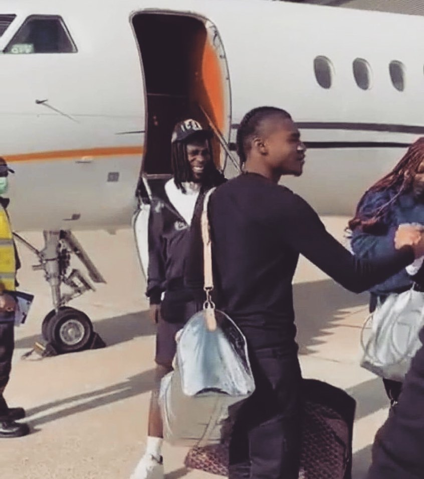 Burna Boy Reportedly Lands In Ghana After His Brawl With Shatta Wale  (PHOTOS)