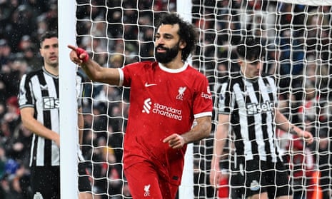 Mohamed Salah celebrates after scoring the opening goal.