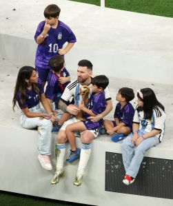 LUSAIL CITY, QATAR - DECEMBER 18: Lionel Messi of Argentina celebrates with his wife Antonela Roccuzzo and their children and family members following the FIFA World Cup Qatar 2022 Final match between Argentina and France at Lusail Stadium on December 18, 2022 in Lusail City, Qatar. (Photo by Richard Heathcote/Getty Images)