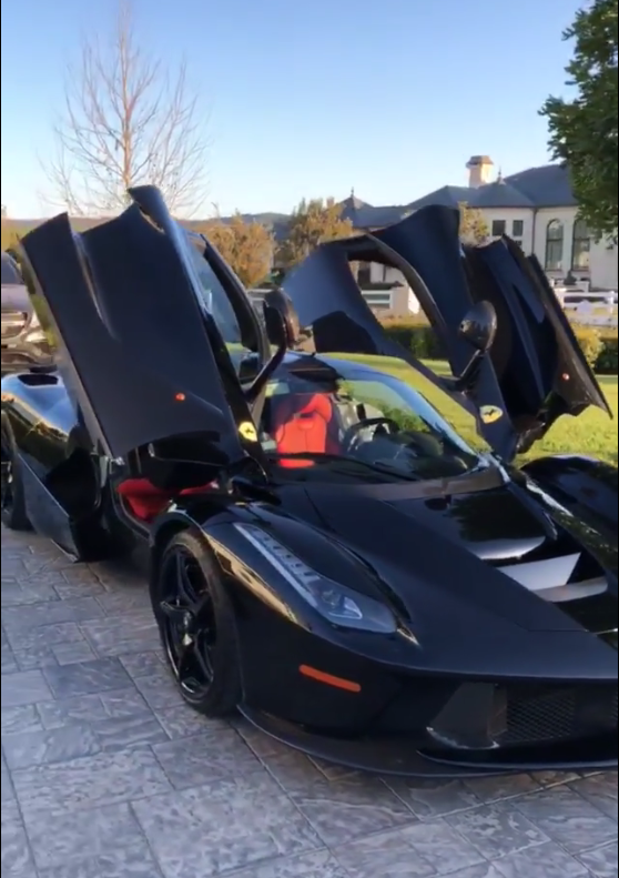 Kylie Jenner unveils her black Ferrari 'push present' after giving birth to  baby Stormi | The Sun