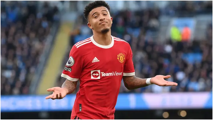 Jadon Sancho celebrates after scoring during the Premier League match between Manchester City and Manchester United at Etihad Stadium. Photo by Laurence Griffiths.