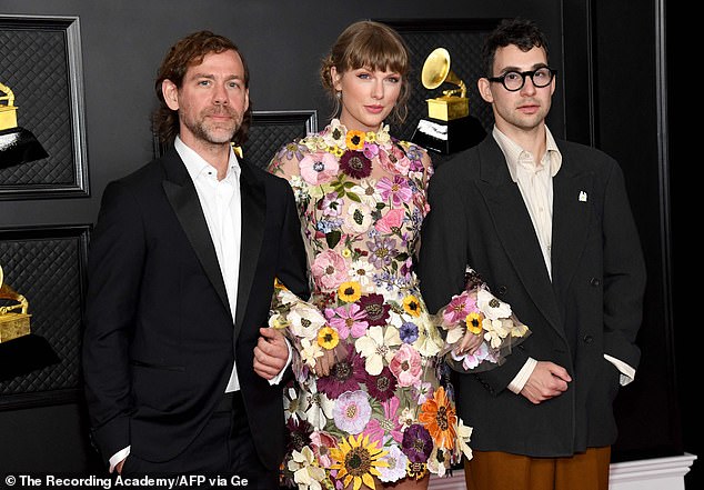 Key collaborators: She posed with her Folklore and Evermore collaborators, The National's guitarist and songwriter Aaron Dessner and songwriter and superproducer Jack Antonoff