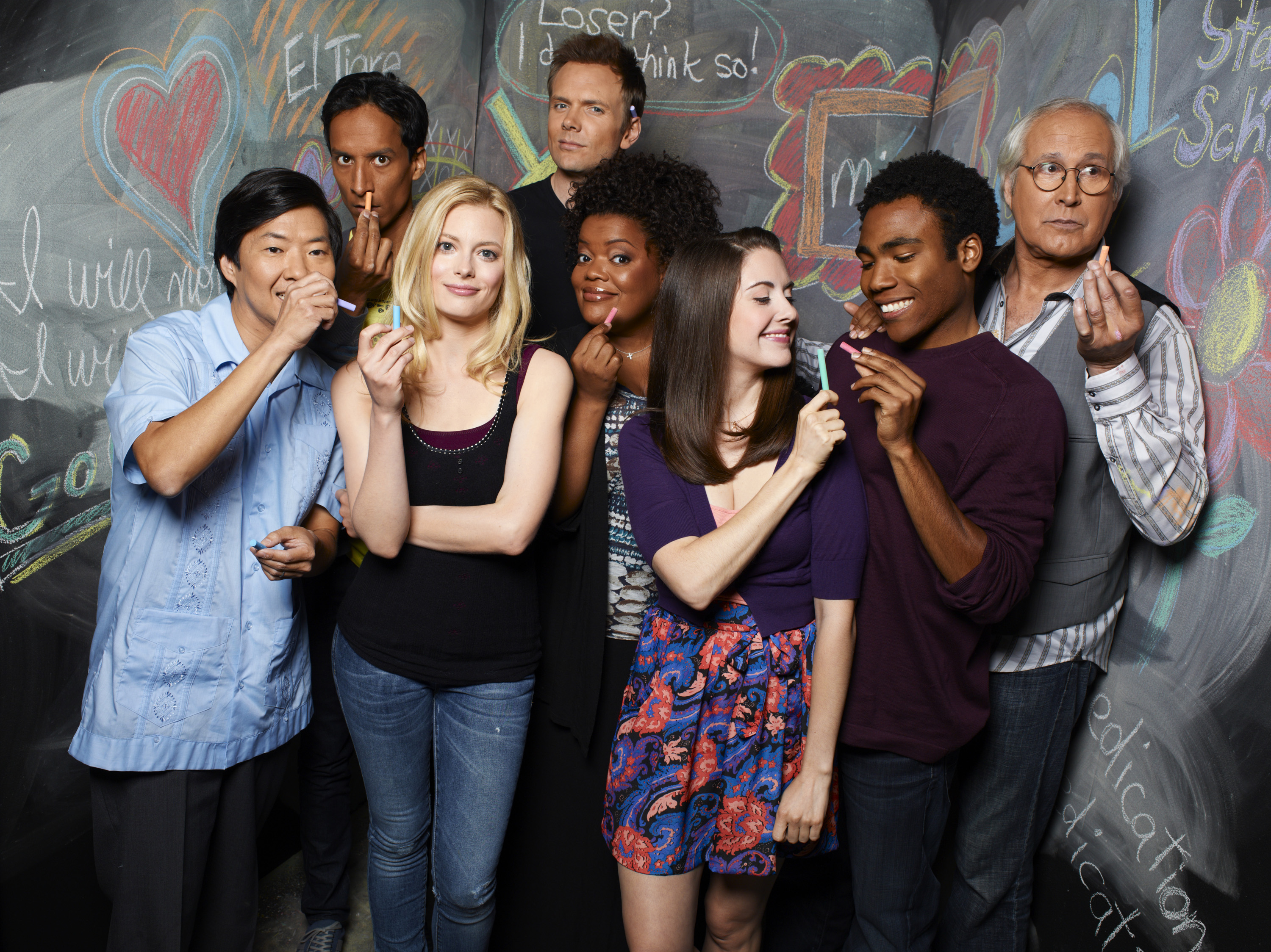 Chevy pictured with the cast of Community