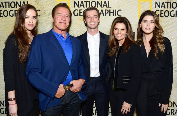 Patrick Schwarzenegger (centre), pictured with Christina, Arnold, his mother Maria Shriver (centre right) and Katherine, is an actor