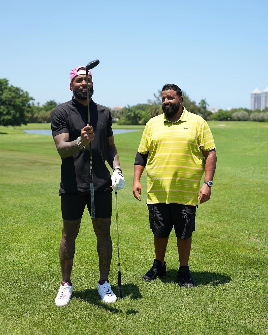 DJ Khaled admiring Odell's gold club. Photo via DJ Khaled's Instagram.