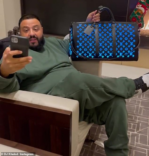 DJ Khaled lights up Instagram with $26,000 color changing Louis Vuitton bag  gifted by wife | Daily Mail Online