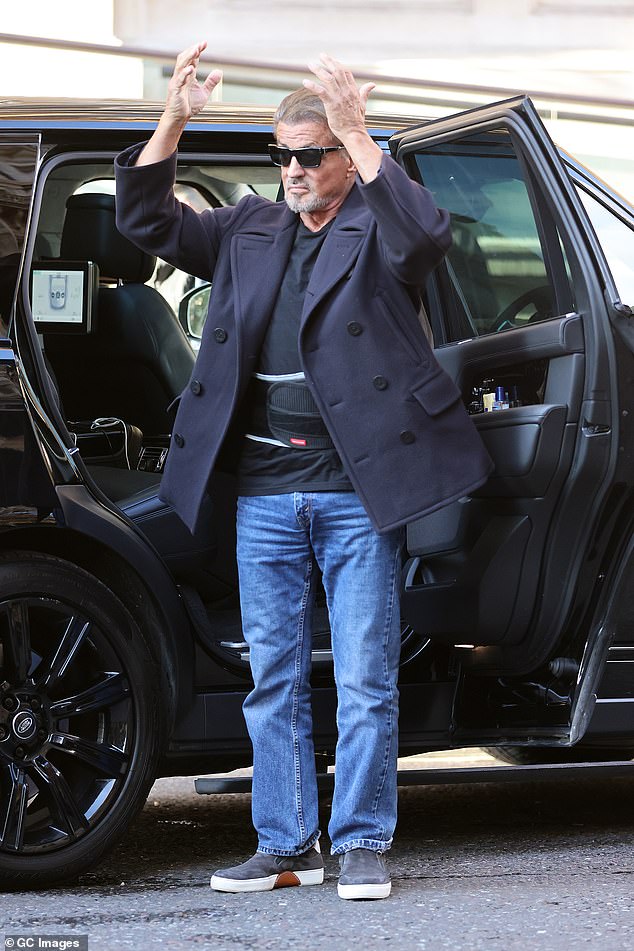 Looking good: The actor completed his laid back look with grey trainers and he donned a pair of sunglasses