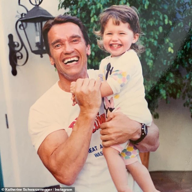 'Dear daddy': Arnold's oldest child Katherine, 30, shared the snap on Instagram along with another shot from her childhood, writing: 'Happy Father¿s Day to my dear daddy!'