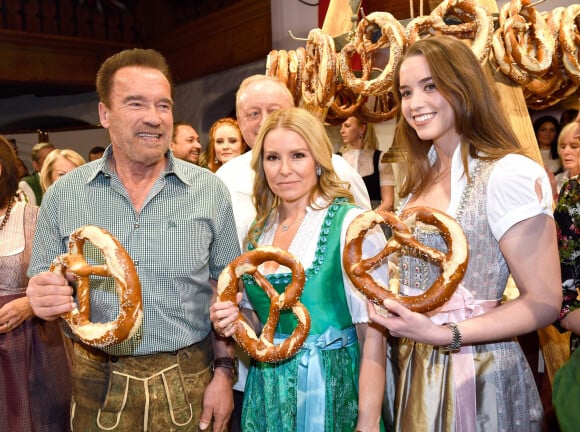 Arnold Schwarzenegger with his partner Heather Milligan and his daughter Christina during the 29th Weisswurstparty at the Stanglwirt Hotel in Going, Austria, on January 27, 2020.