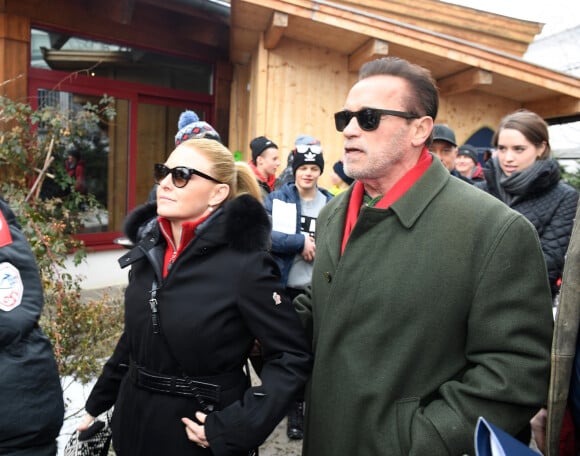 Arnold Schwarzenegger and his partner Heather Milligan attend the Audi FIS Alpine Skiing World Cup Men's Slalom at Ganslern Alm in Kitzbuhel, Austria, January 26, 2020.