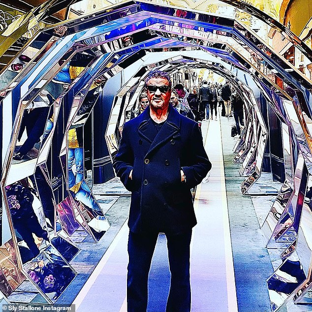 Upcoming: 'In England to start working all the new expendables that also has the new cast members,' Sylvester teased alongside a crisp-looking shot of himself posing within a mirrored tunnel