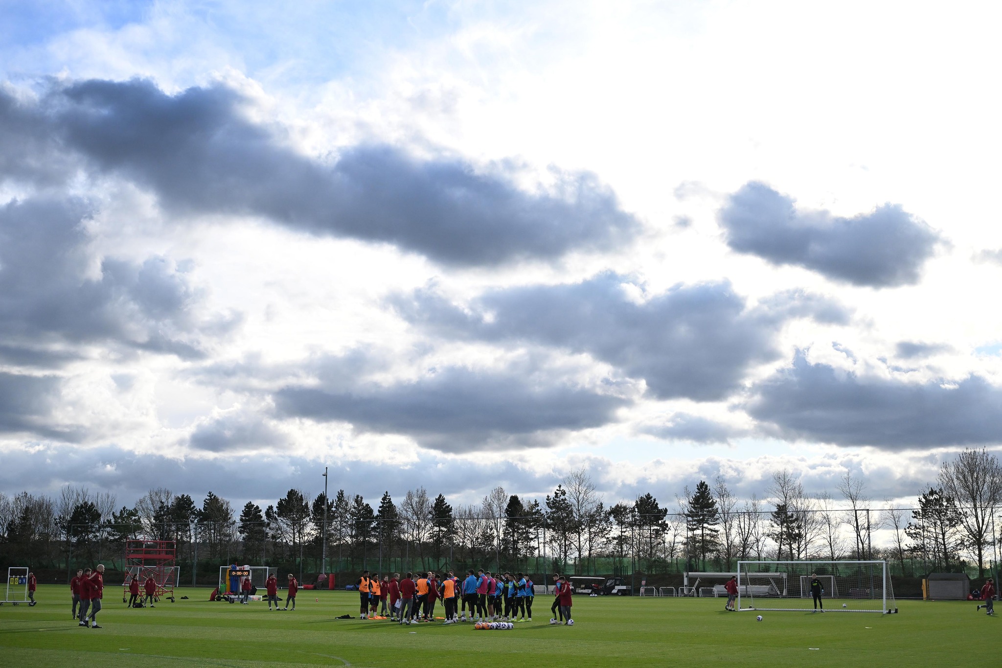 May be an image of 8 people, people playing football, people playing American football and grass