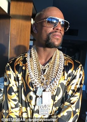 Floyd Mayweather flaunted his wealth in his latest Instagram video where he is clad in gold