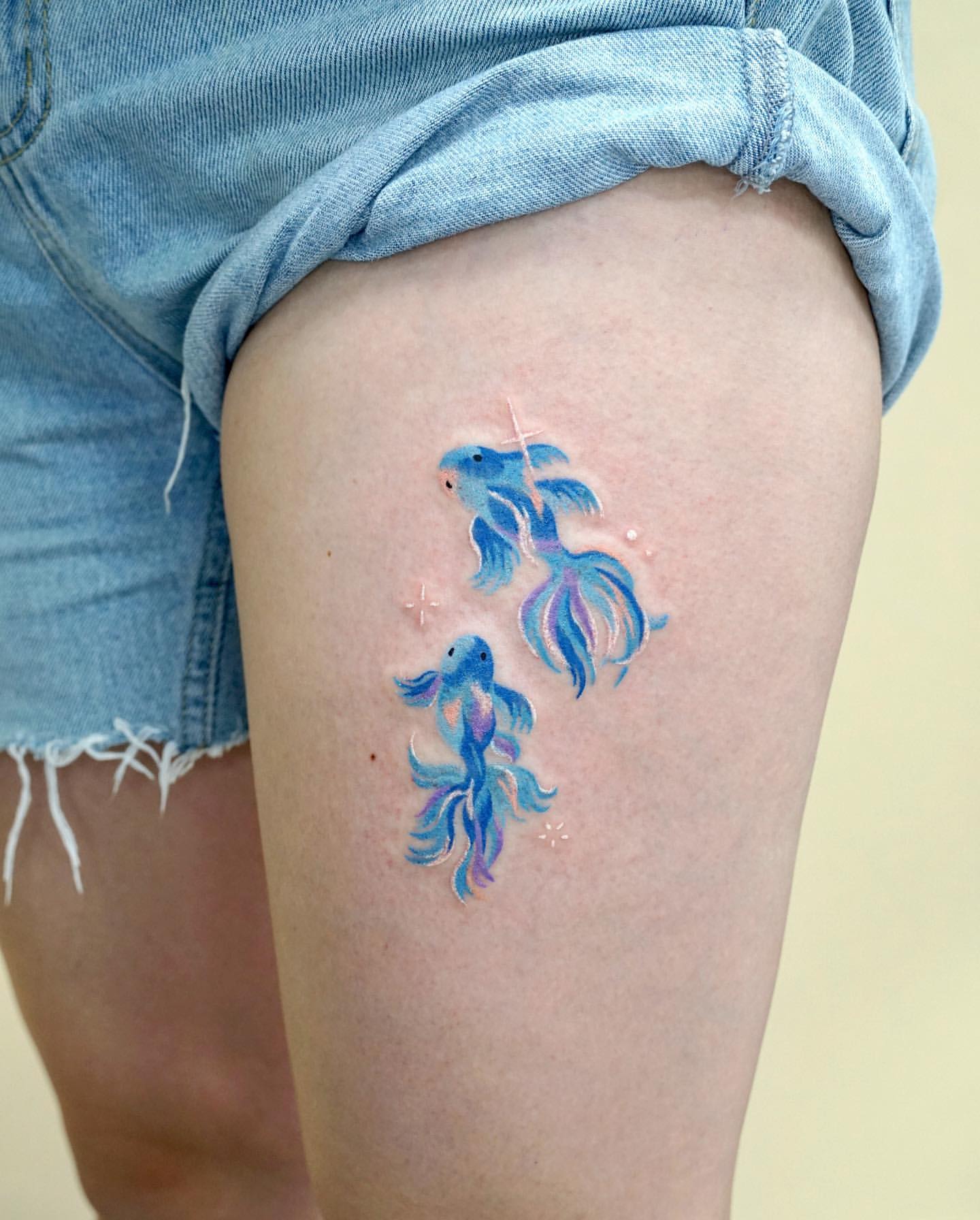 Thigh Tattoos for Women 18