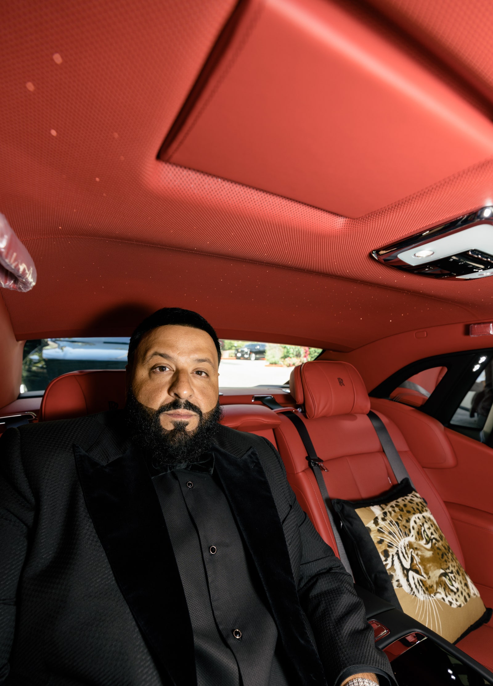 Image may contain Cushion Disc Jockey Khaled Human Person Vehicle Transportation Automobile Car and Accessories