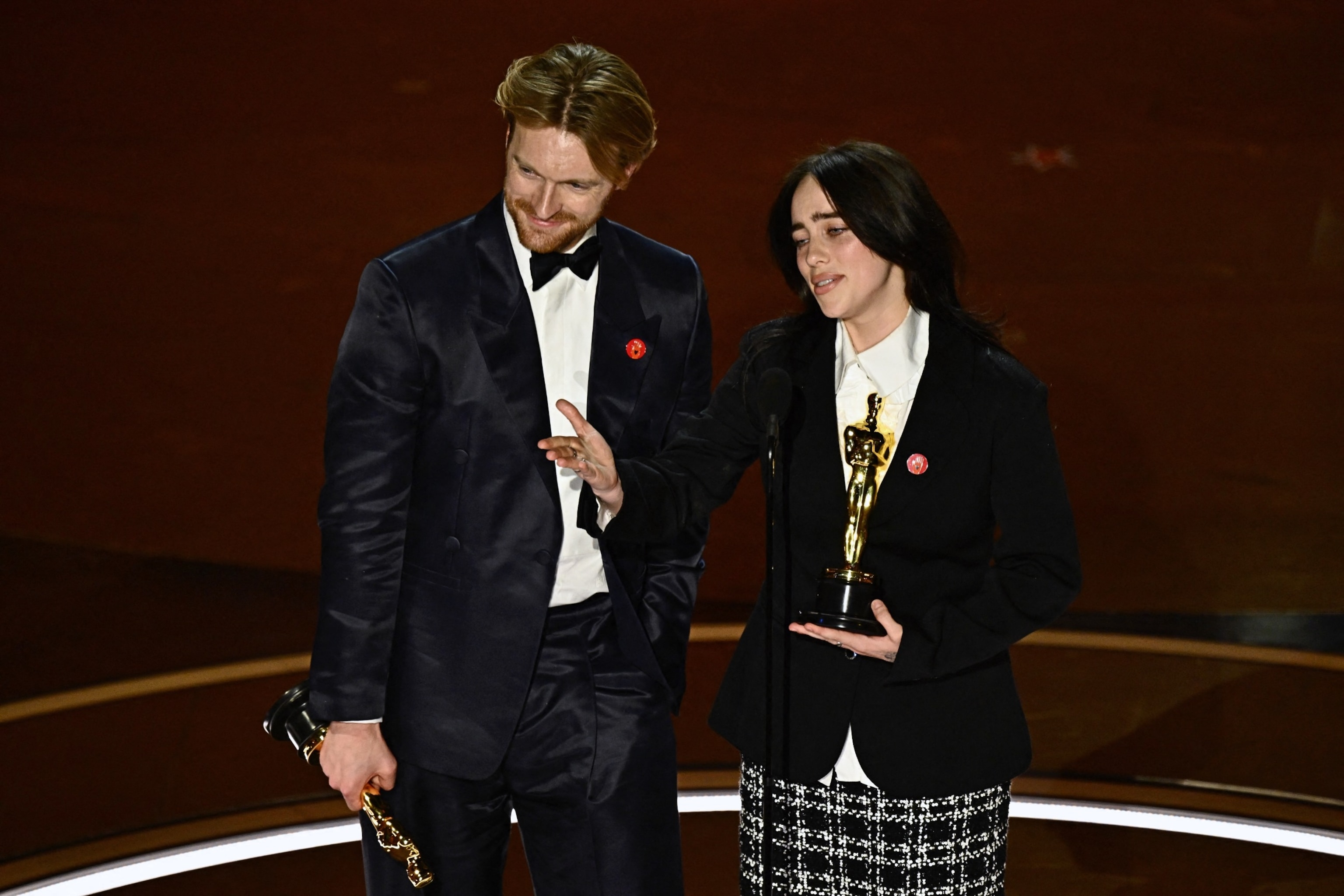 PHOTO: Billie Eilish (R) and US singer-songwriter Finneas O'Connell accept the award for Best Original Song for "What Was I Made For" from "Barbie" onstage during the 96th Annual Academy Awards at the Dolby Theatre in Hollywood, Calif. on March 10, 2024.