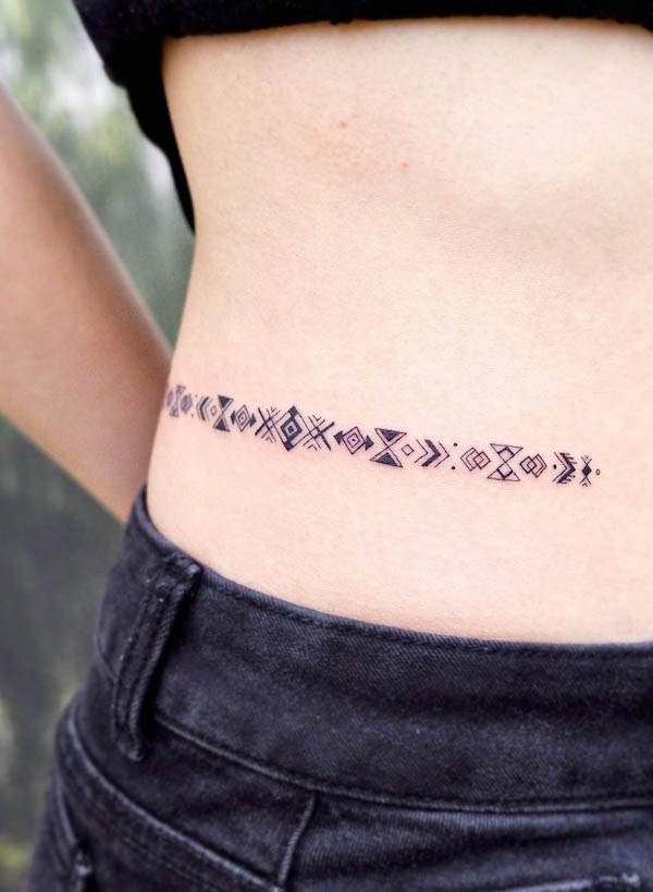 Ethnic strip waist tattoo by @pin.ornaments