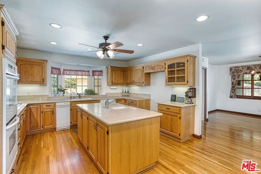 The kitchen which leads to the dining area.