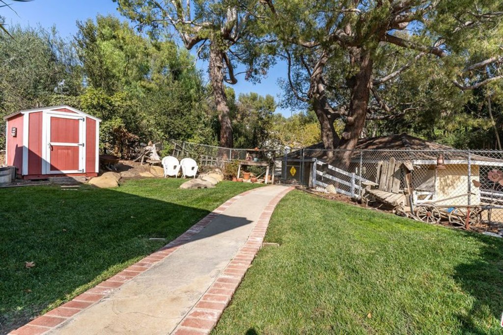 The front lawn was recently replaced with drought-resistant AstroTurf.