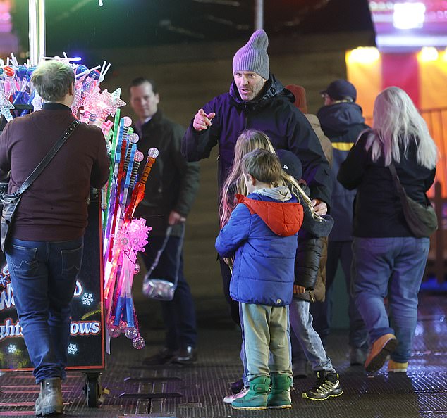 Browsing: The kids appeared attracted to the novelty light store