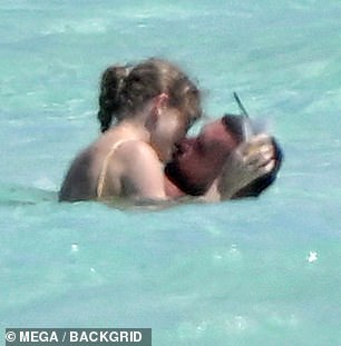 At one point, the popstar planted a loving kiss on her boyfriend's lips