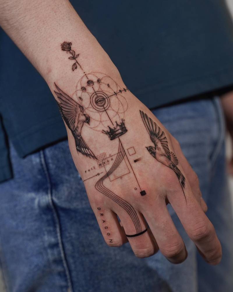 Graphic style hand composition tattoo.