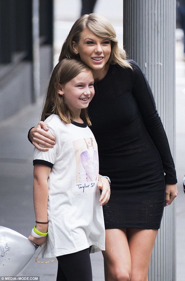 Her lucky day! Taylor Swift delighted one young fan when she pulled her car over to say hello in the street after spotting the youngster walking around in one of her concert T-shirts 