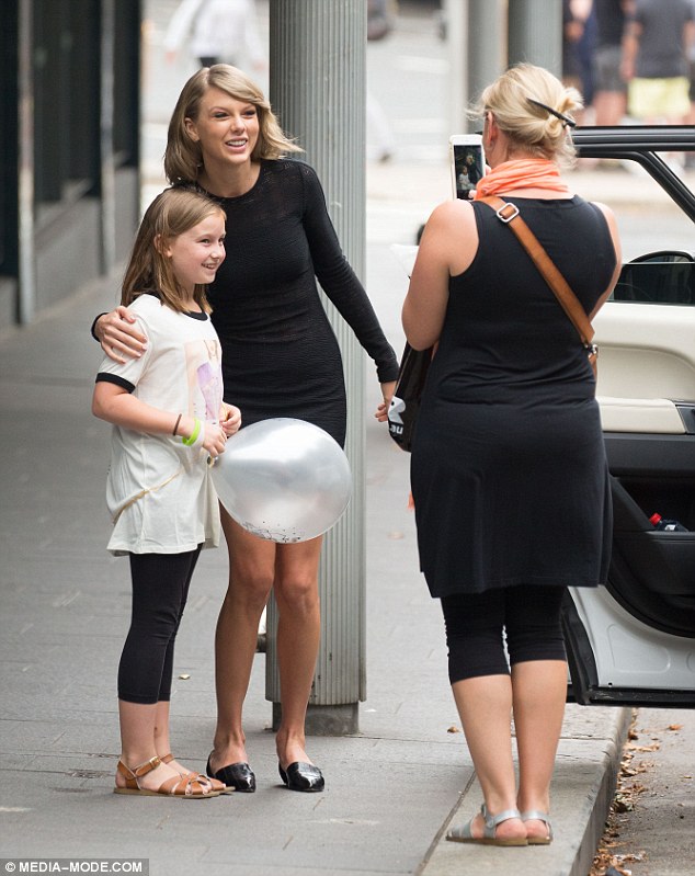 Capturing the moment: The young girl's mother was on hand to take plenty of photographs of the chance encounter