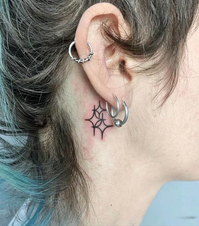 Shine like the stars ear tattoo by @nein666_tattoo