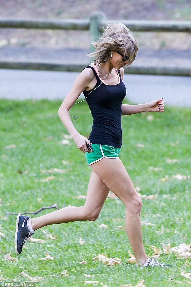 Upping the pace: After her hike, the Shake It Off songstress still had some more energy so kicked it up a notch at the base of the hill and ran back and forth in a grassy picnic area