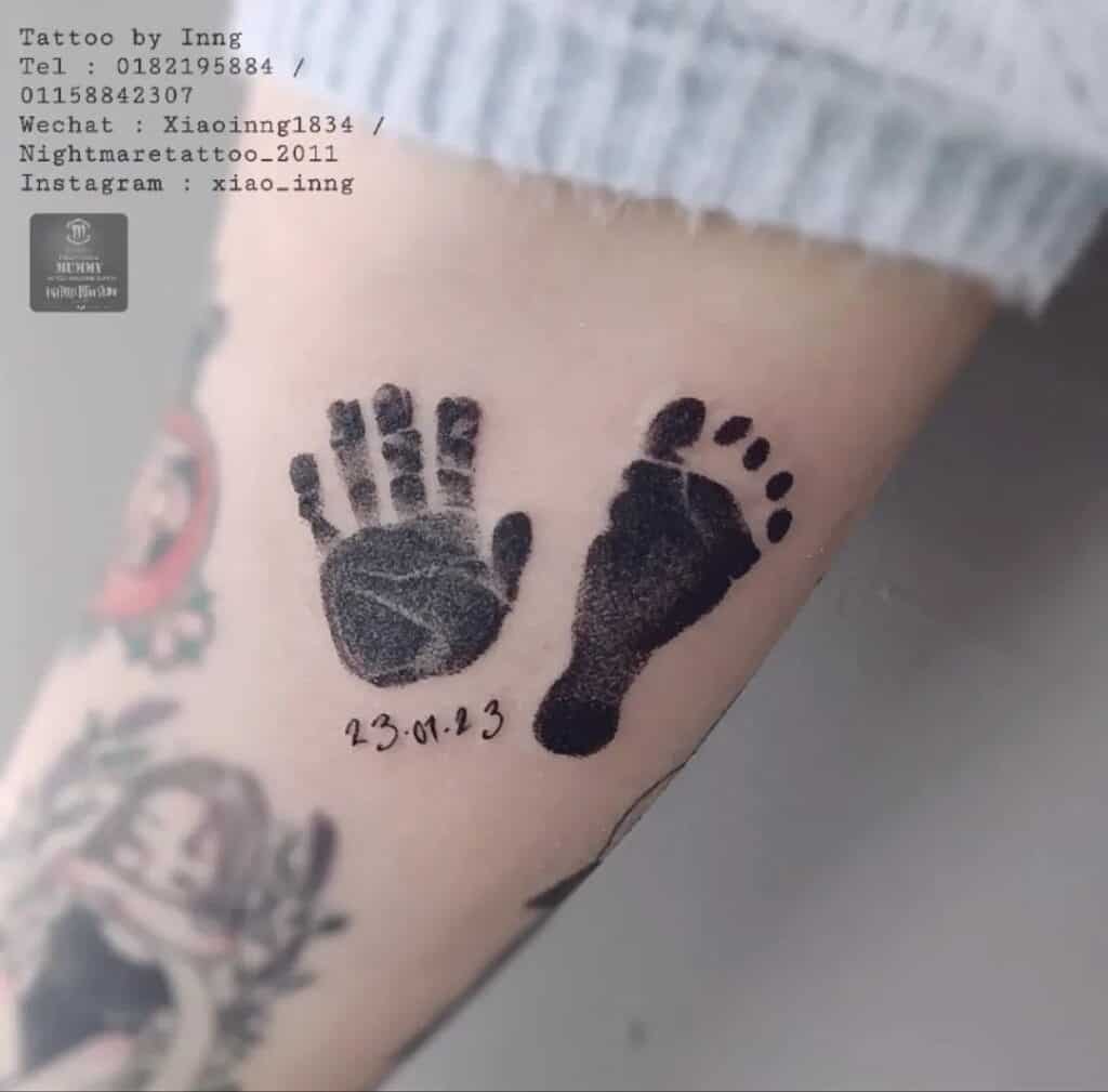 handprint and footprint with date