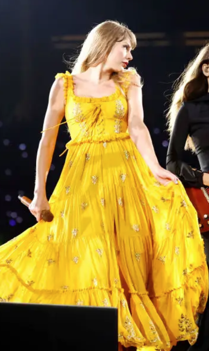 Who made Taylor Swift's yellow lace up dress? – OutfitID