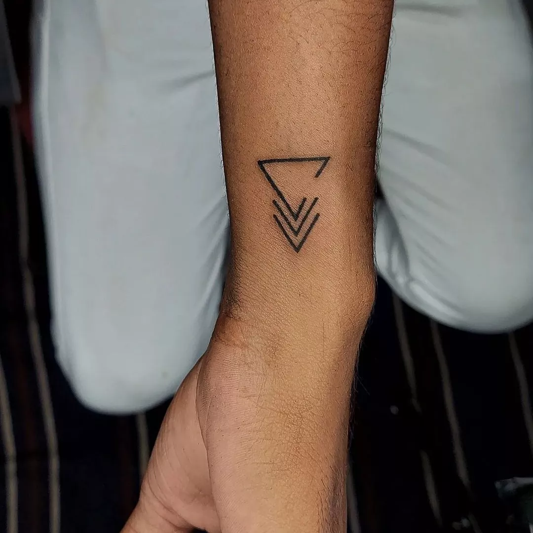 black triangle wrist tattoo