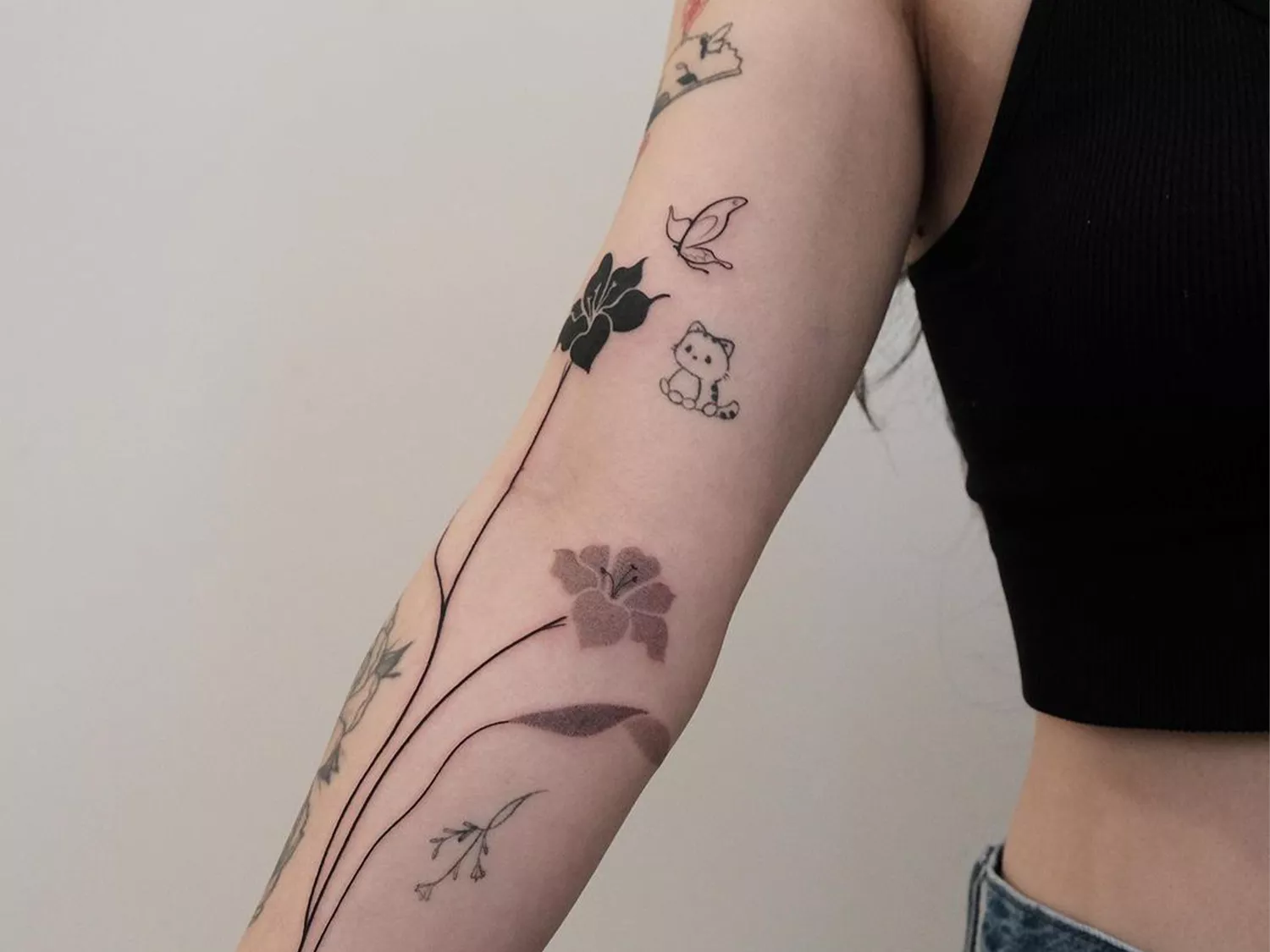 flower forearm tattoo