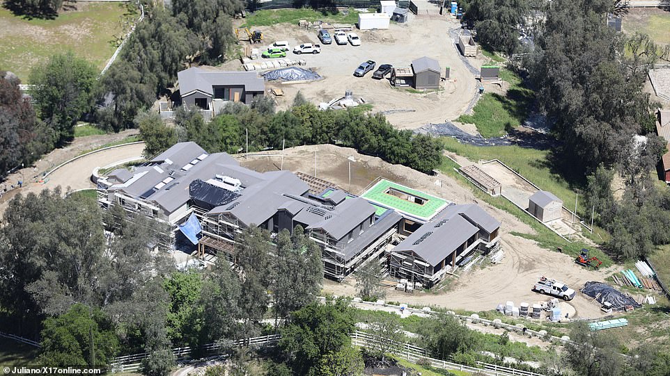 In most recent photos all the top finishings of the home have been completed, including the roof as well as the sauna installation. Once a barren patch of dirt, the lot has undergone a transformation by dedicated landscapers