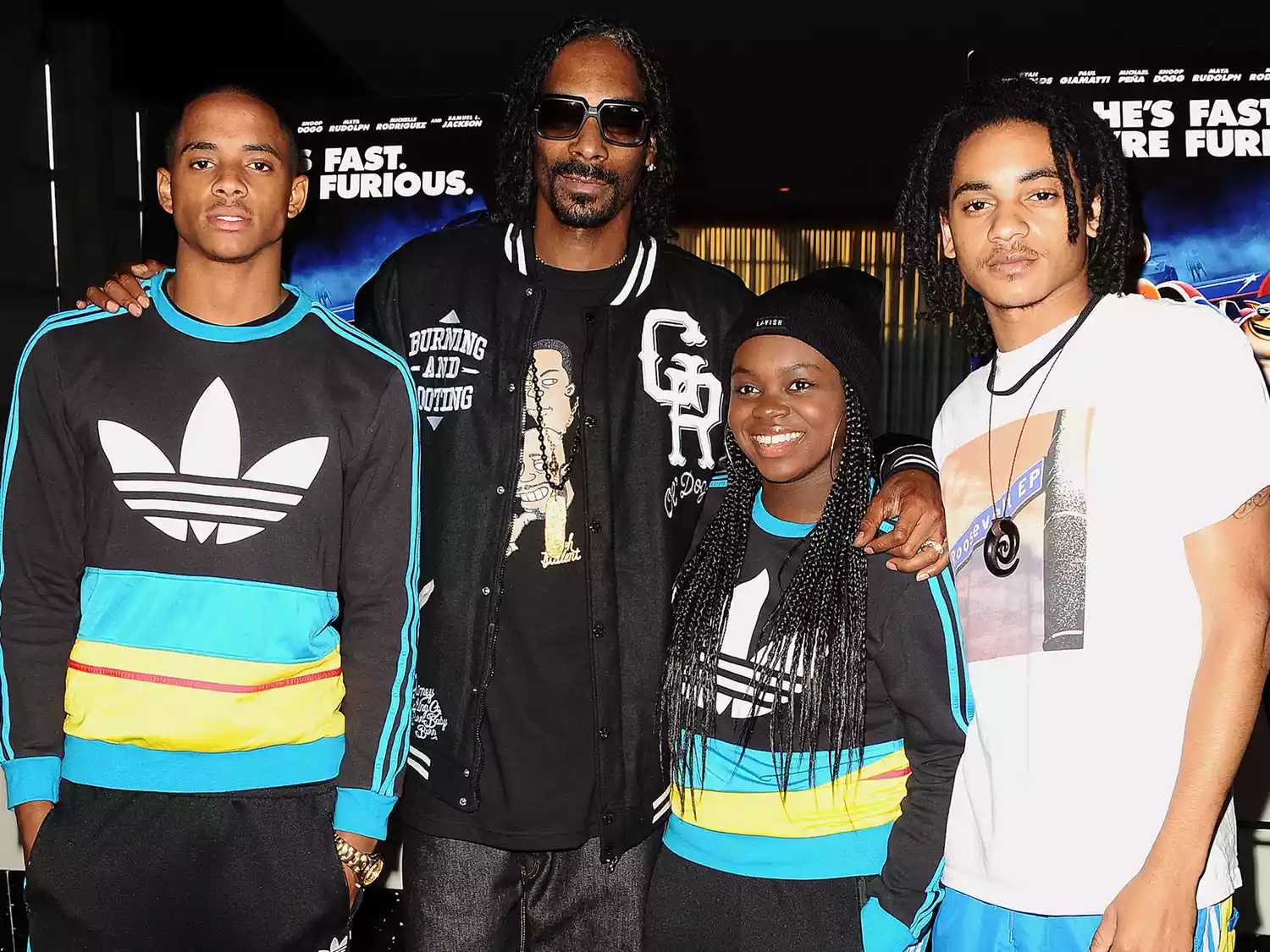 Snoop Dogg aka Snoop Lion and children Cordell Broadus, Cori Broadus and Corde Broadus at ArcLight Hollywood on July 16, 2013 