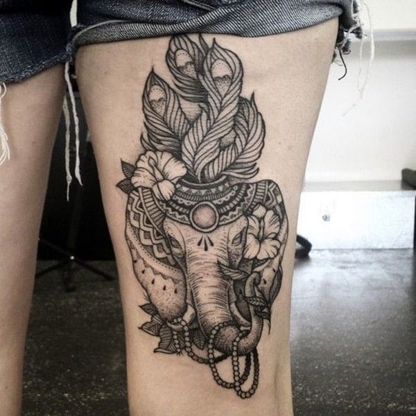 Photo of elephant tattoo on leg for women