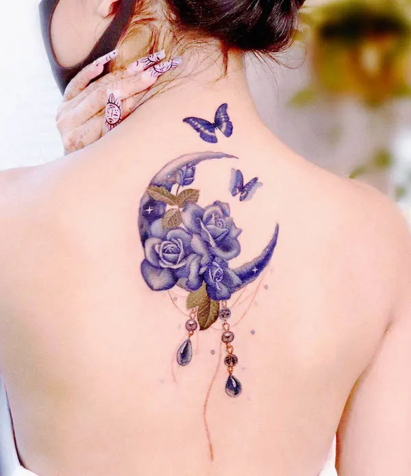 Stunning rose and butterfly dreamcatcher by @peria_tattoo