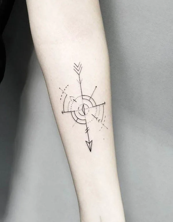 Arrow and abstract compass tattoo by @noamyona__