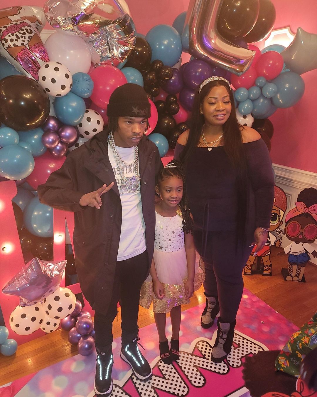 Lil Baby posed with George Floyd’s child Gianna and her mom Roxie Washington