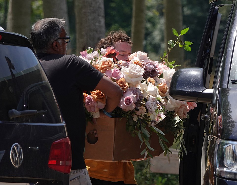 No expense spared! The England defender and his wife, who officially said their vows at Crewe Registry Office in May, chose an array of pink, peach, and white roses to make their day special