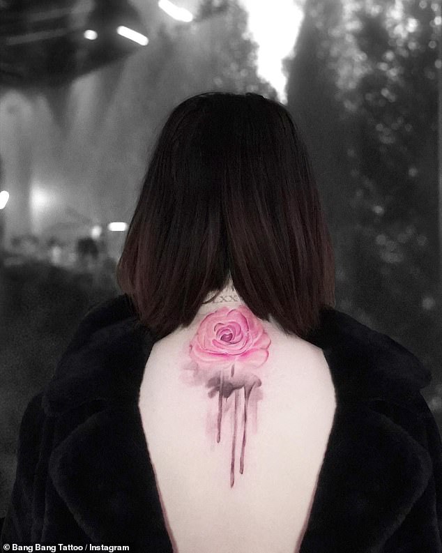 New ink! Gomez's tattoo artist, Keith Scott McCurdy, posted a photo of the stunning pink rose on her back on his Instagram account